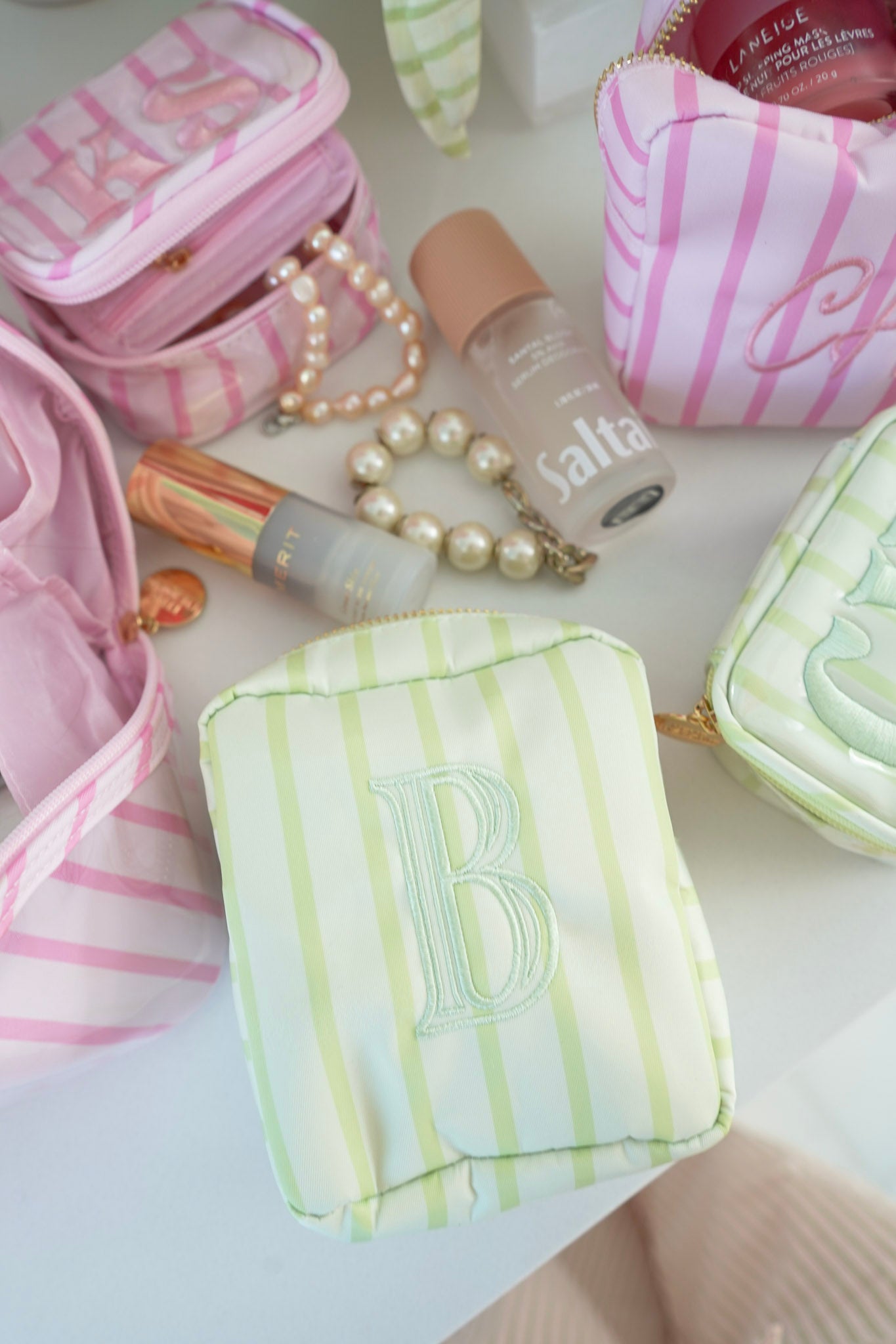 Nylon Striped Makeup Bag Collection
