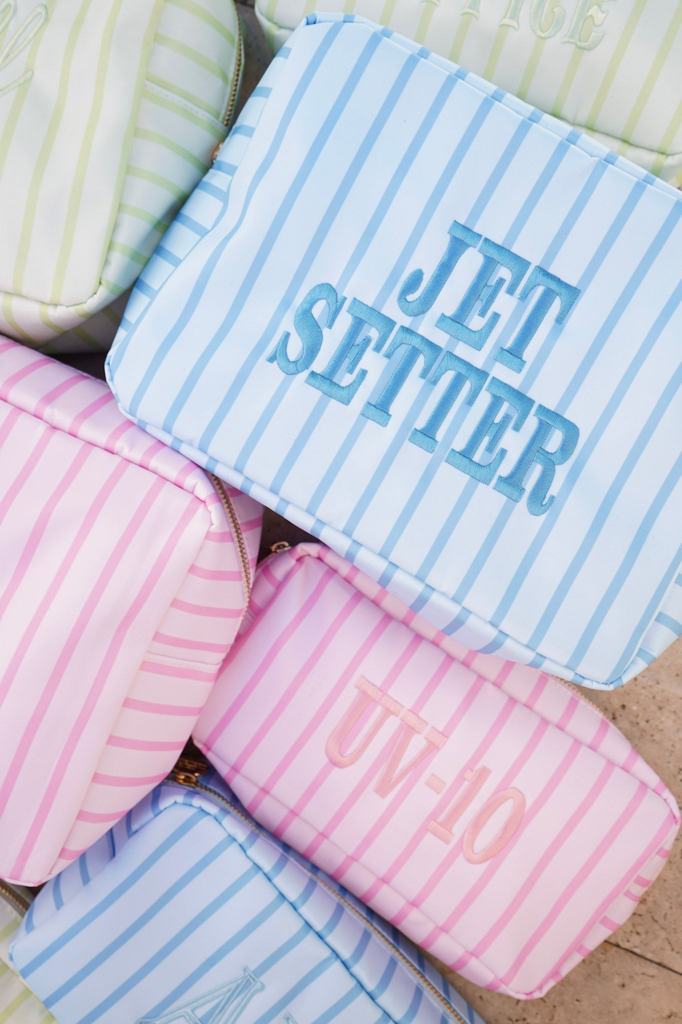 Nylon Striped Makeup Bag Collection