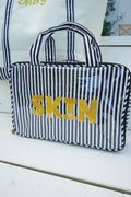 Skin - Striped Clear Coat Toiletry Case